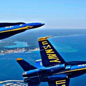 Blue Angels jets flying over coastal waters